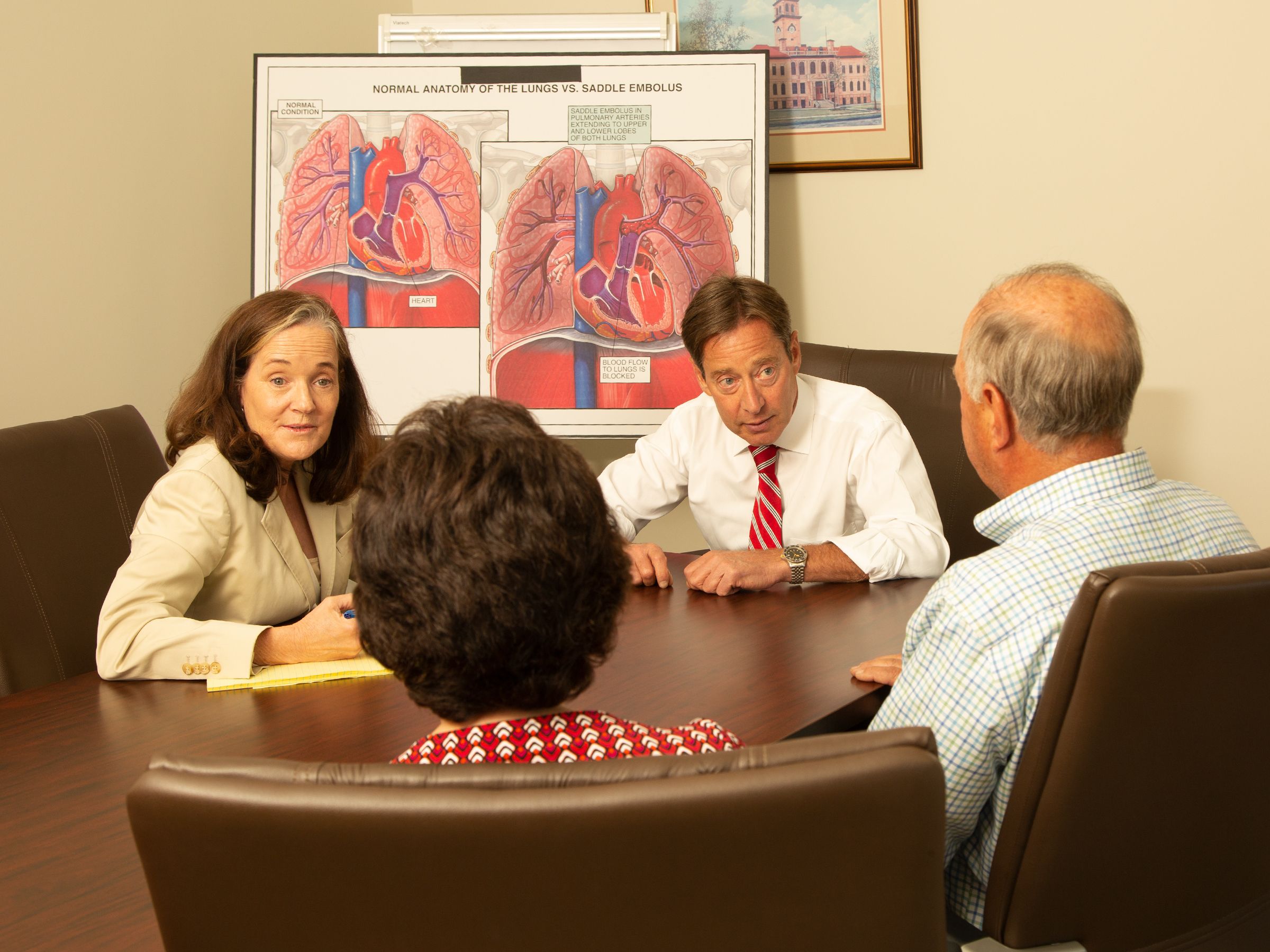 Attorneys Working With Clients 